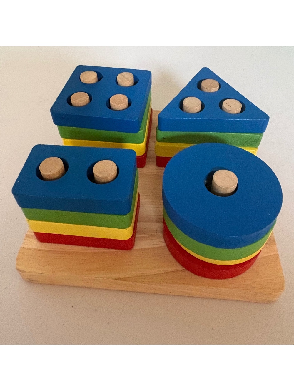 1, 2, 3, 4 peg shape game